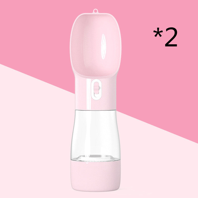 Pink 2-in-1 portable pet water and food dispenser bottle with handle