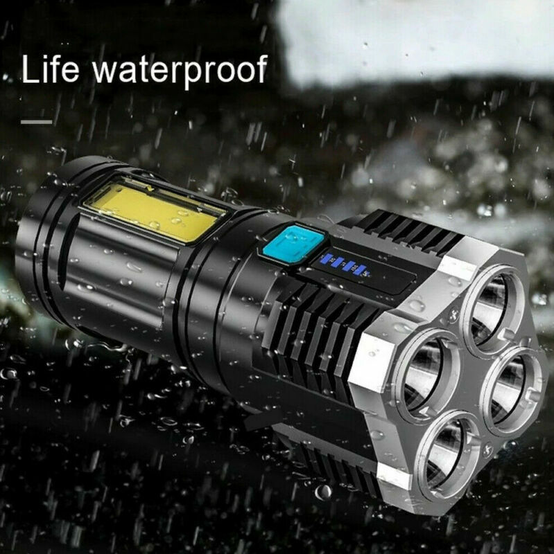 Black tactical flashlight with front lens forward, water droplets on the body