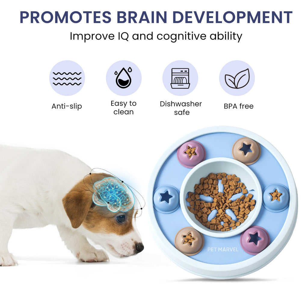 Blue dog puzzle slow feeder with star compartments and center bowl, with a puppy nearby
