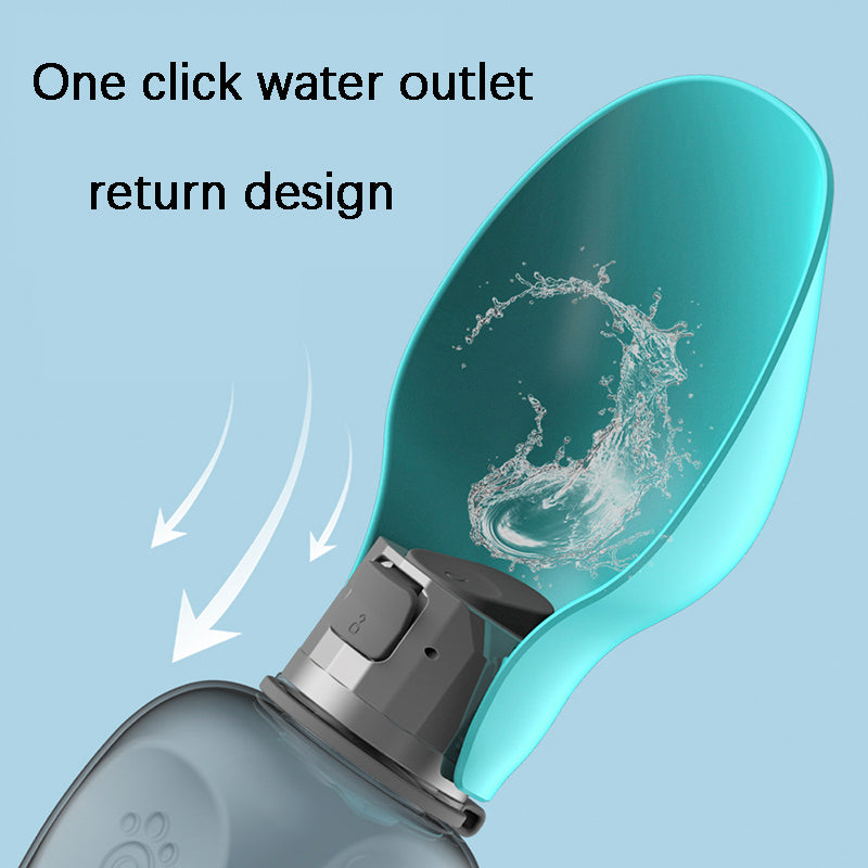 Foldable dog water bottle with teal trough and spout outlet, water flowing into bowl