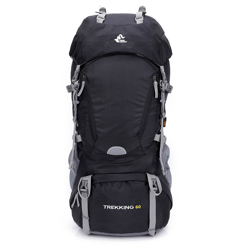 Black hiking backpack with front pocket, side compression straps, and padded harness