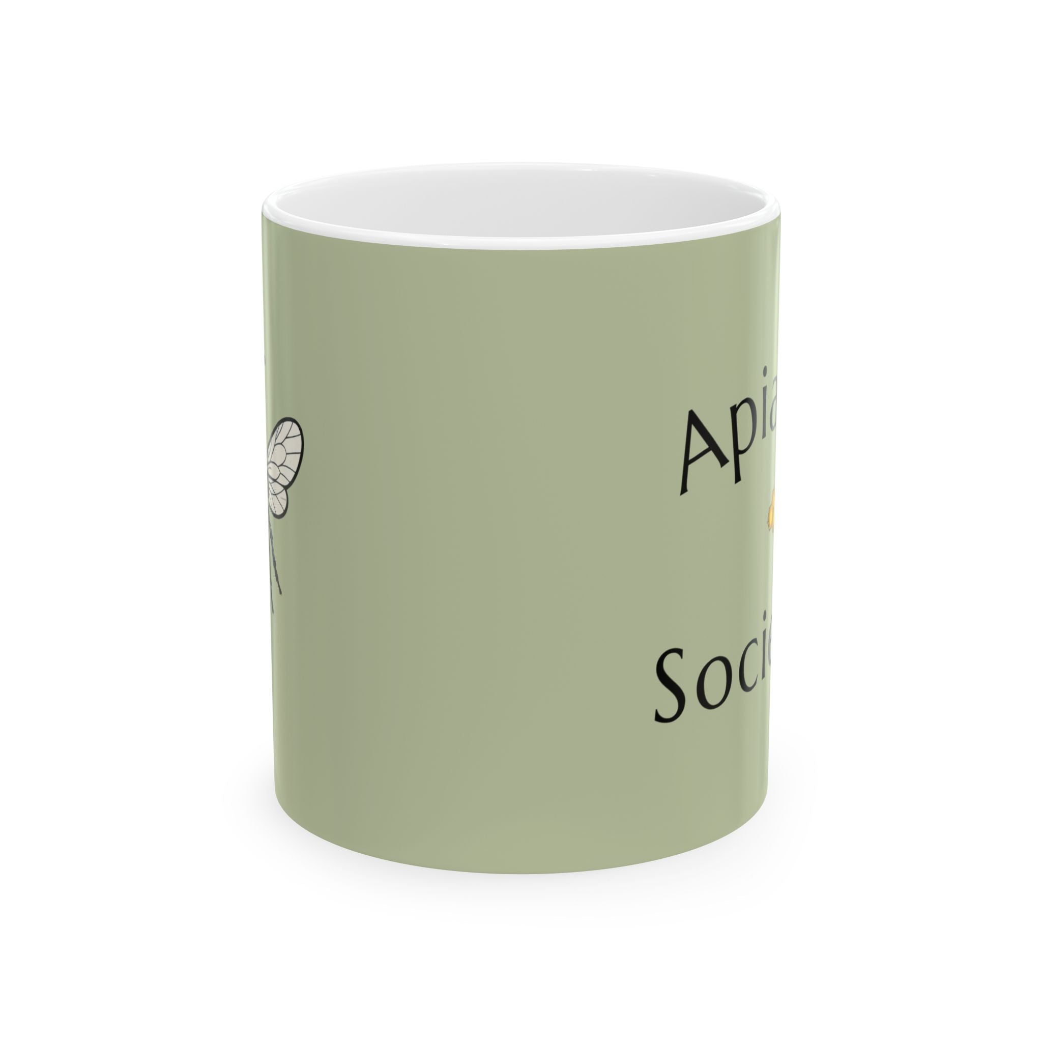 Green ceramic mug with partial Apiary Society text and bee illustration.