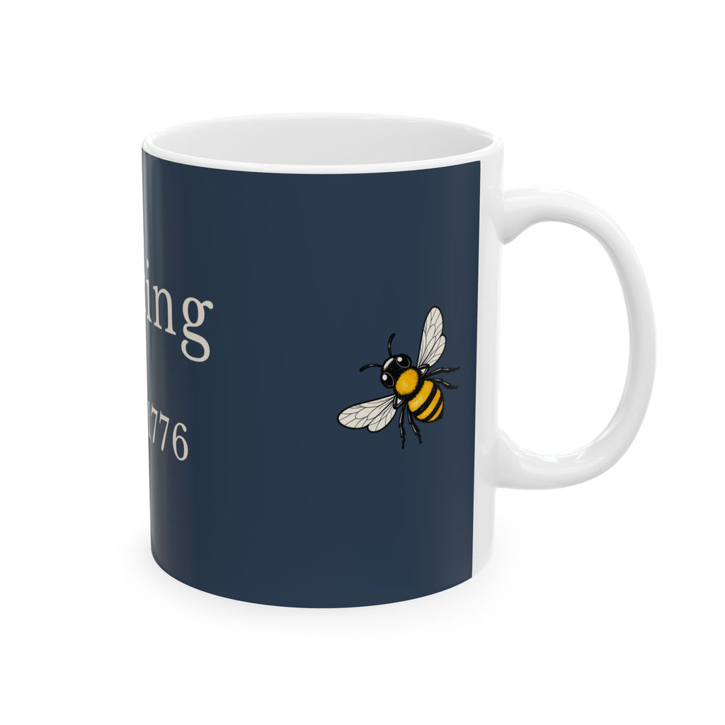 Navy ceramic mug with bee graphic and partial 'Since 1776' text