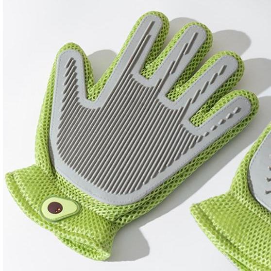 Green pet grooming glove with striped silicone bristles and paw-shaped comb teeth