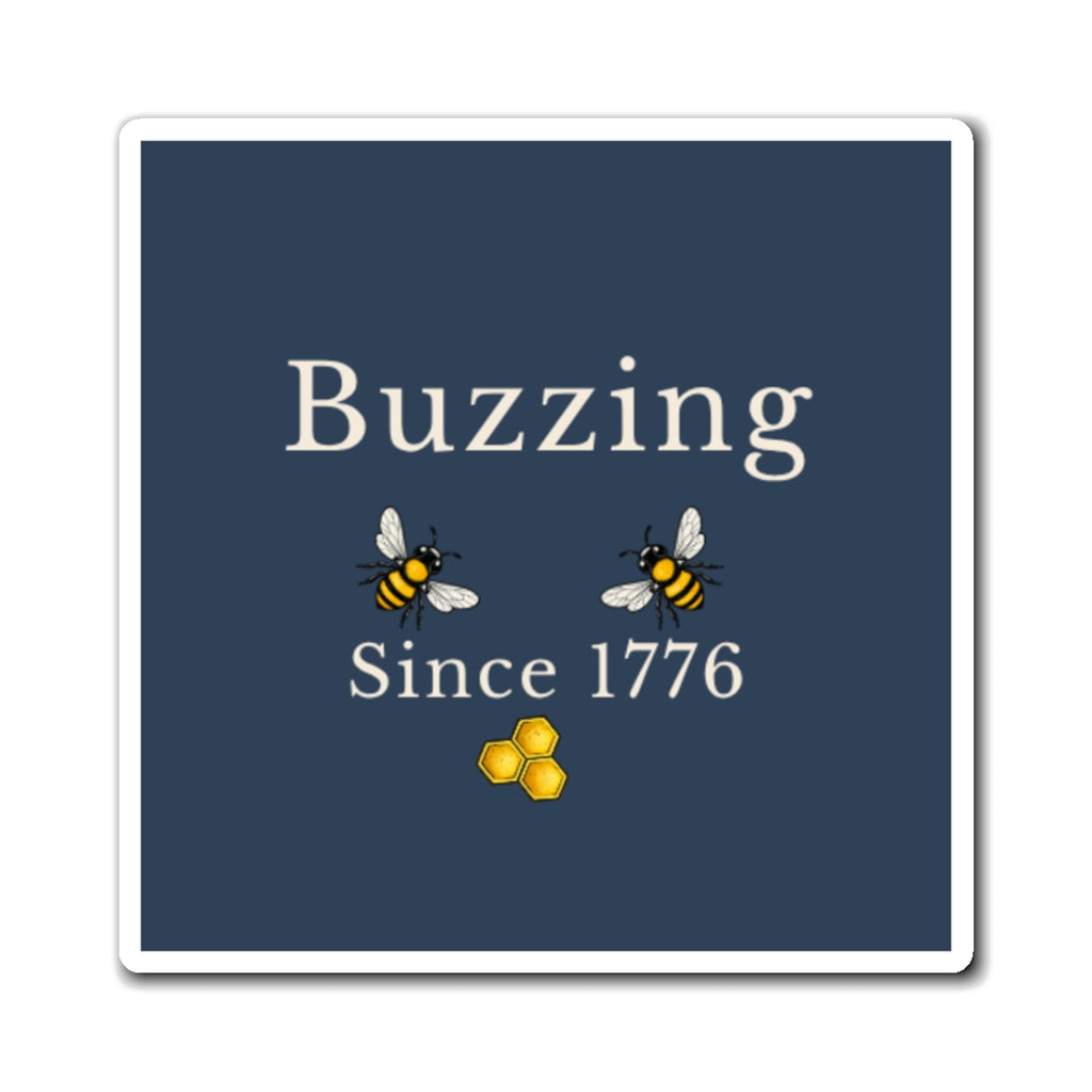 Bee refrigerator magnet close-up: dark blue square with two bees and honeycomb icon