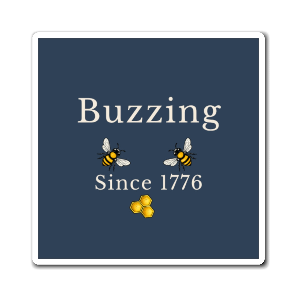 Bee refrigerator magnet close-up: dark blue square with two bees and honeycomb icon