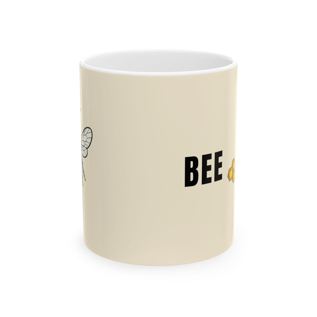 Cream ceramic mug with BEE text and honeybee graphic
