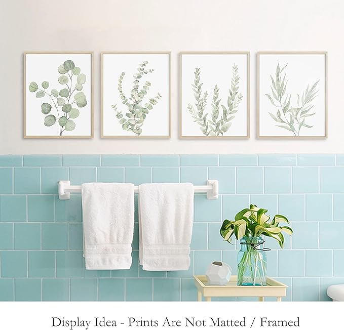 Set of 4 framed botanical leaf canvas prints in gold-tone frames