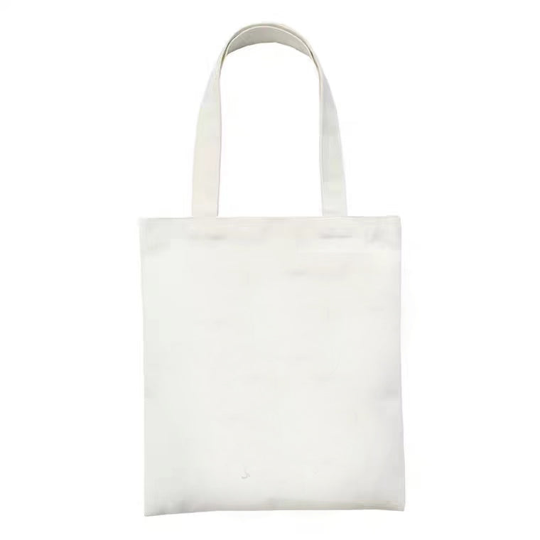 Plain canvas tote bag with top handles, unprinted front panel.
