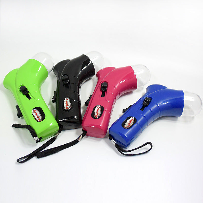 Handheld pet snack feeders in green, black, pink, and blue with clear treat chambers.