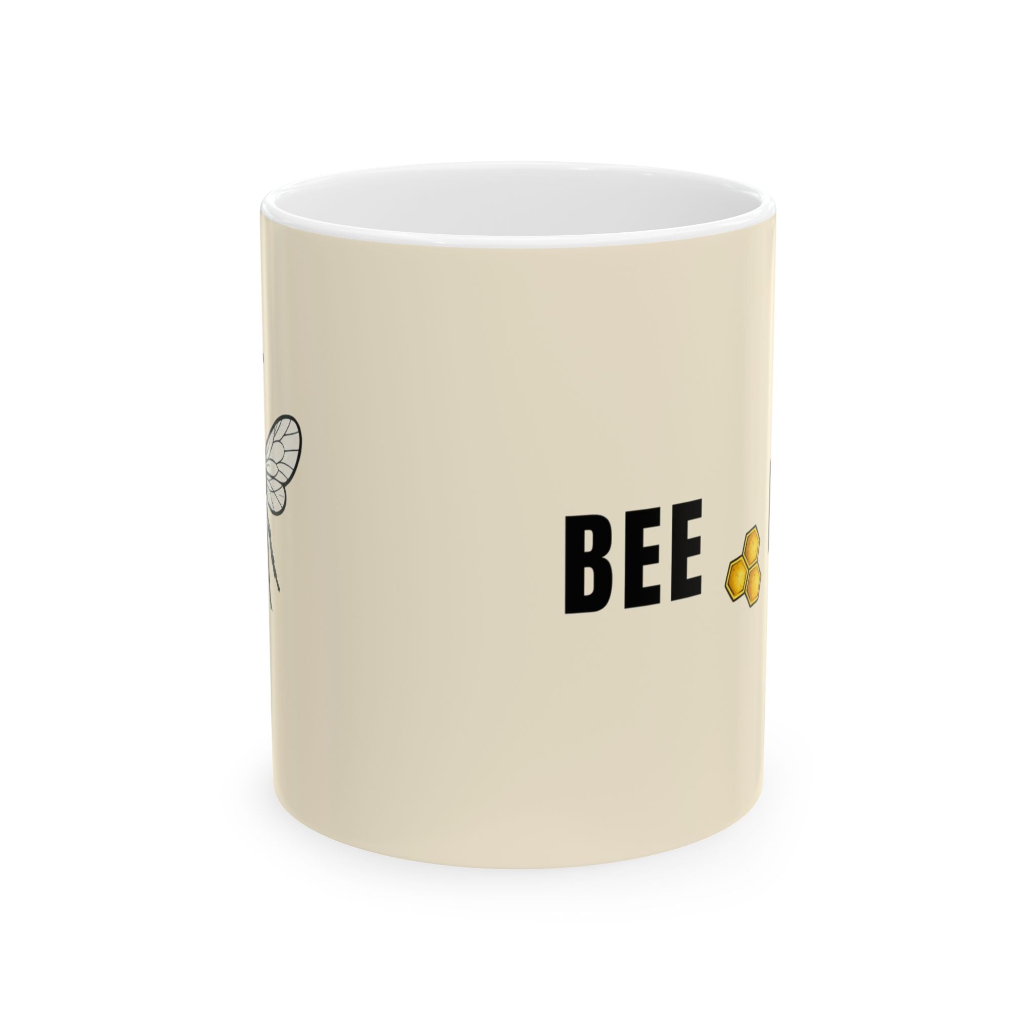 Beige ceramic mug with 'BEE' text and small bee illustration on side