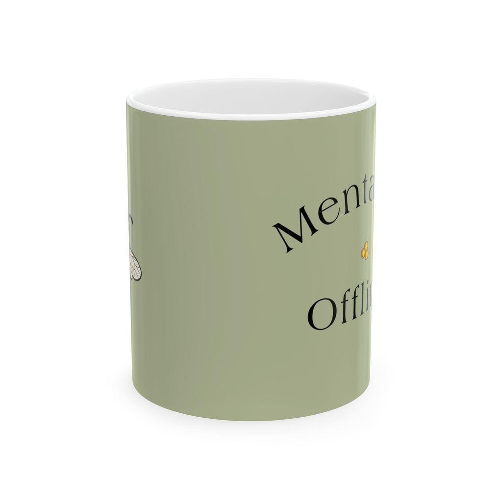 Olive green mug with partial black text wrap design