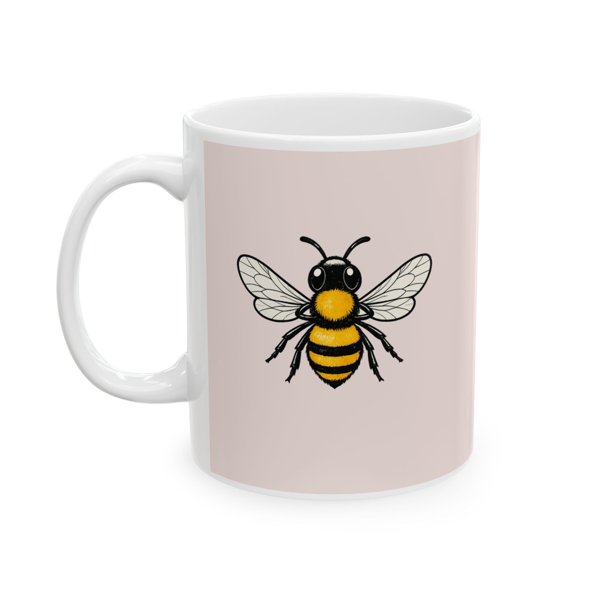 Pink ceramic coffee cup with large cartoon bee graphic on front