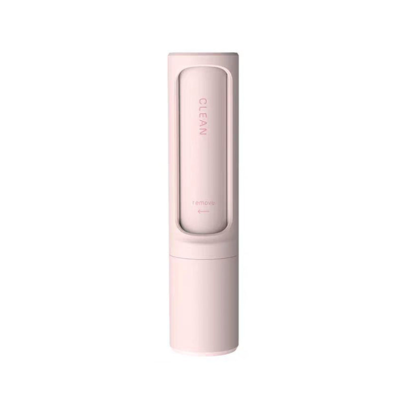 Pink self-cleaning pet hair remover brush with textured roller head