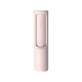 Pink self-cleaning pet hair remover brush with textured roller head
