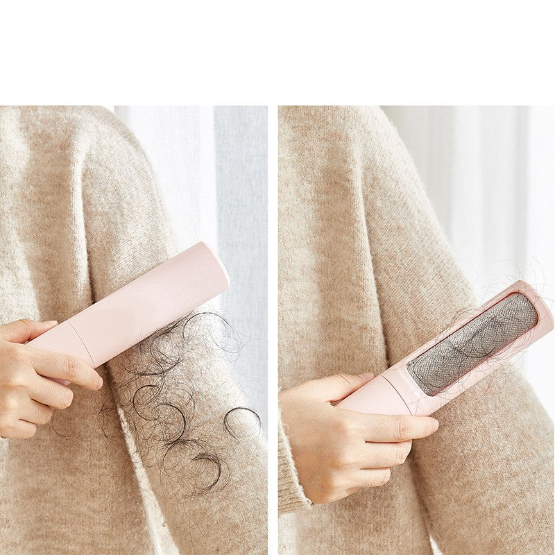 Pink self-cleaning pet hair remover brush lifting hair from beige fabric