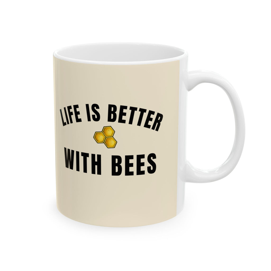 Cream ceramic coffee cup with "Life is better with bees" and honeycomb icon