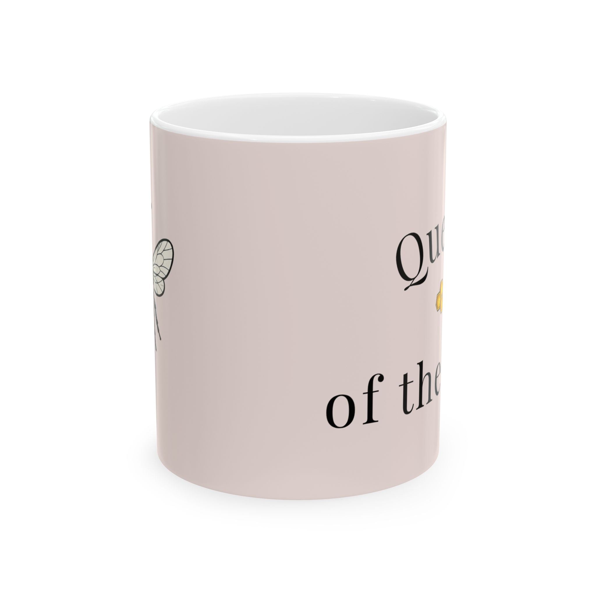 Light pink mug with bee graphic and partial text on side