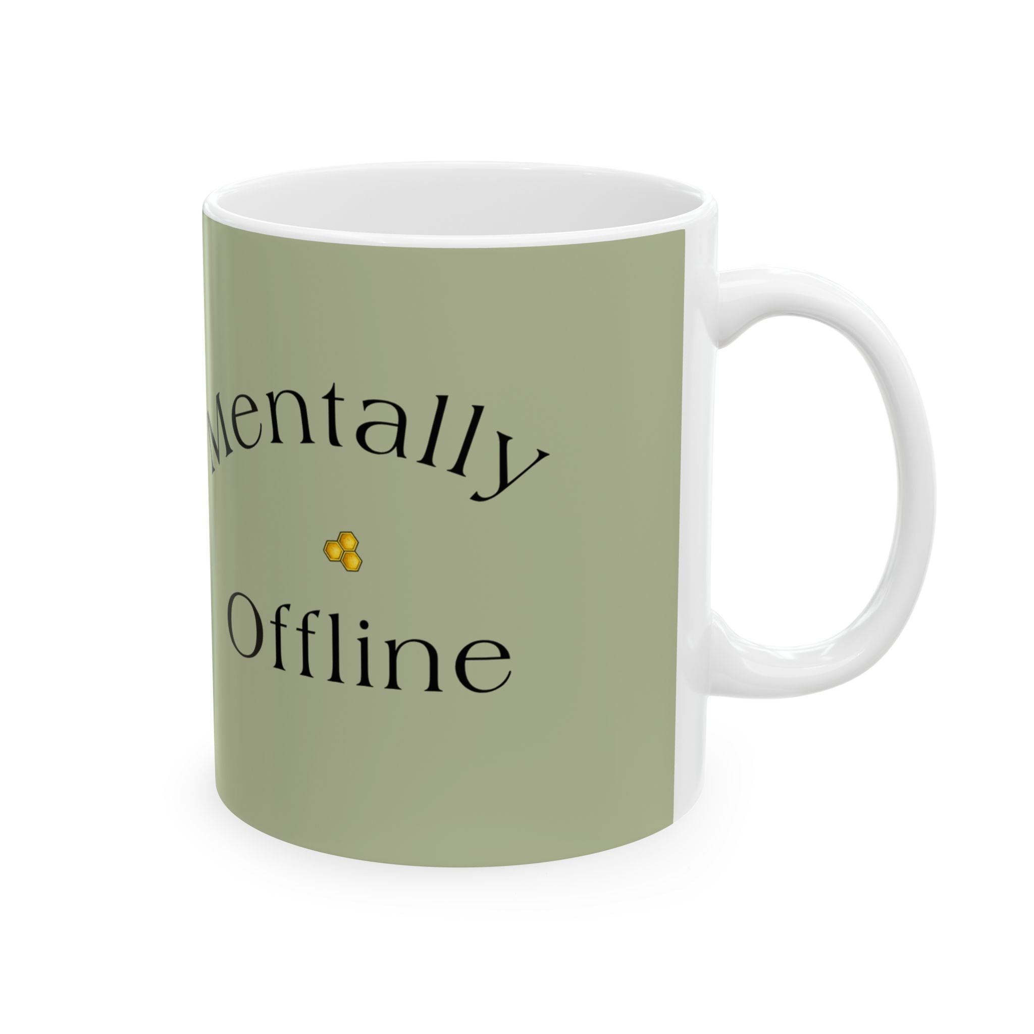 Olive green mug with curved black slogan text and small yellow flower icon