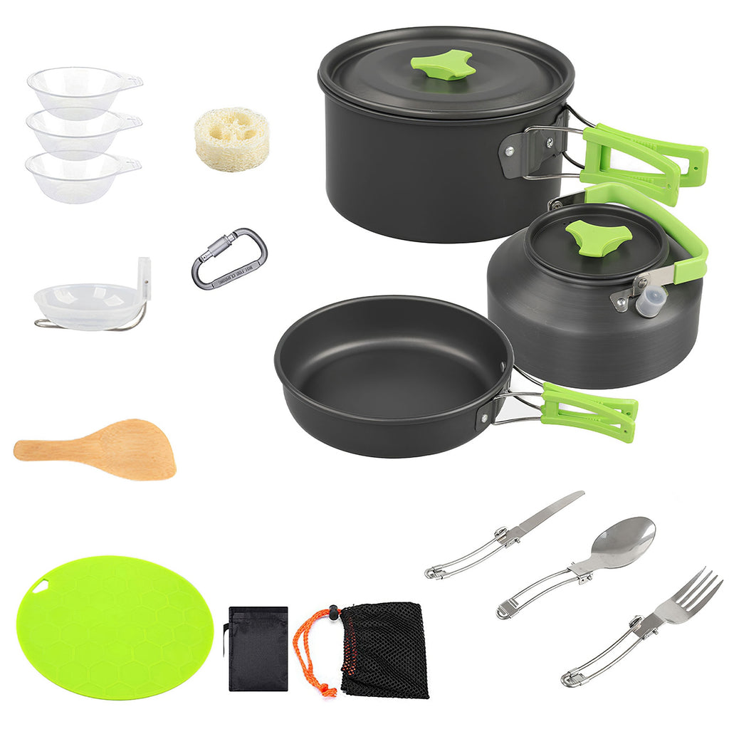 All-in-one cookware set with black pots and pan, green handles, utensils, bowls, and board