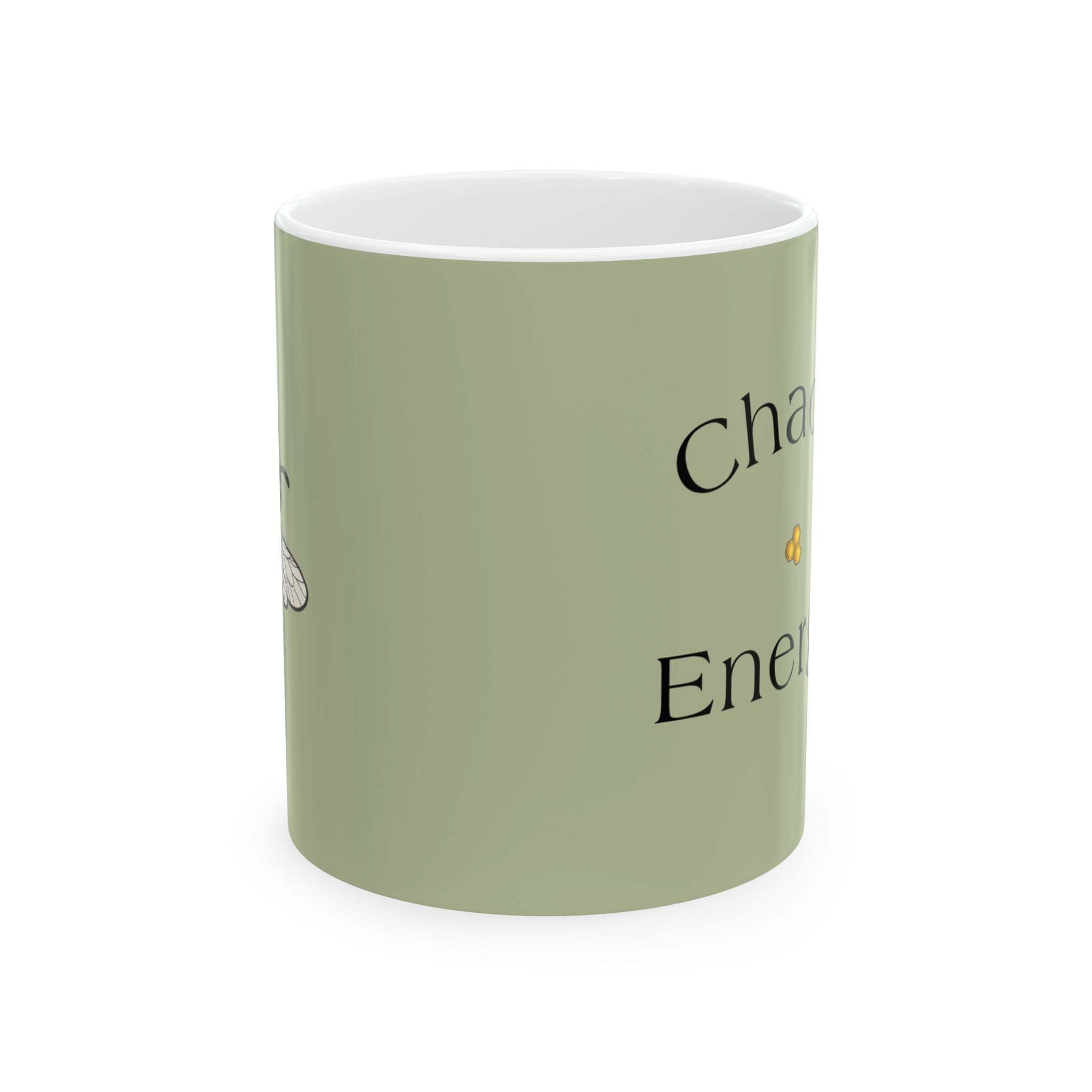 Green ceramic mug with partial black text design on side