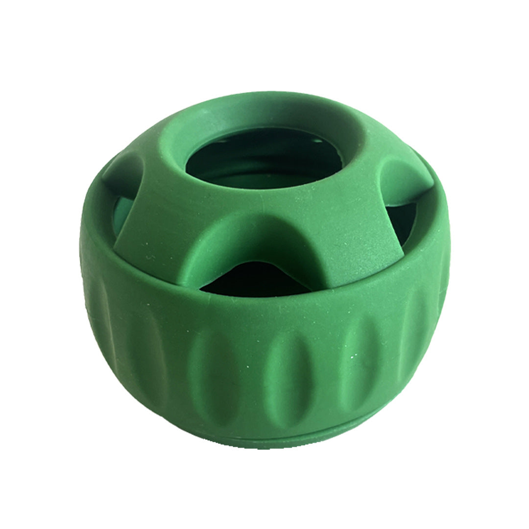 Green silicone slow feeder ball with central opening and side feeding holes