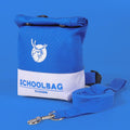Blue dog self-wearing backpack harness with adjustable straps and attached leash