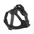 Black dog harness with reflective white stripes and two front buckle straps