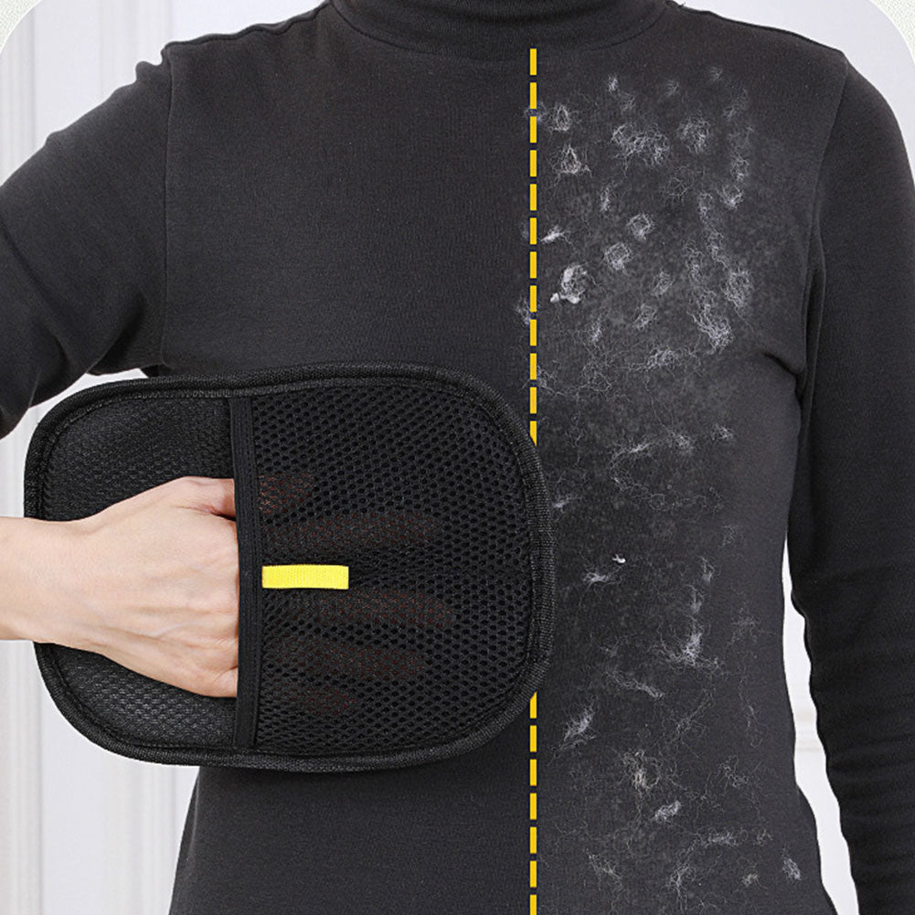 Pet grooming deshedding glove shown on a dark shirt area with lint removal pad