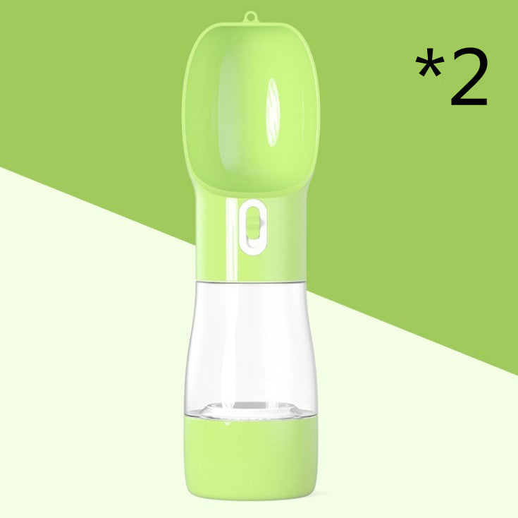 2-in-1 portable pet water and food dispenser in light green with clear lower cup