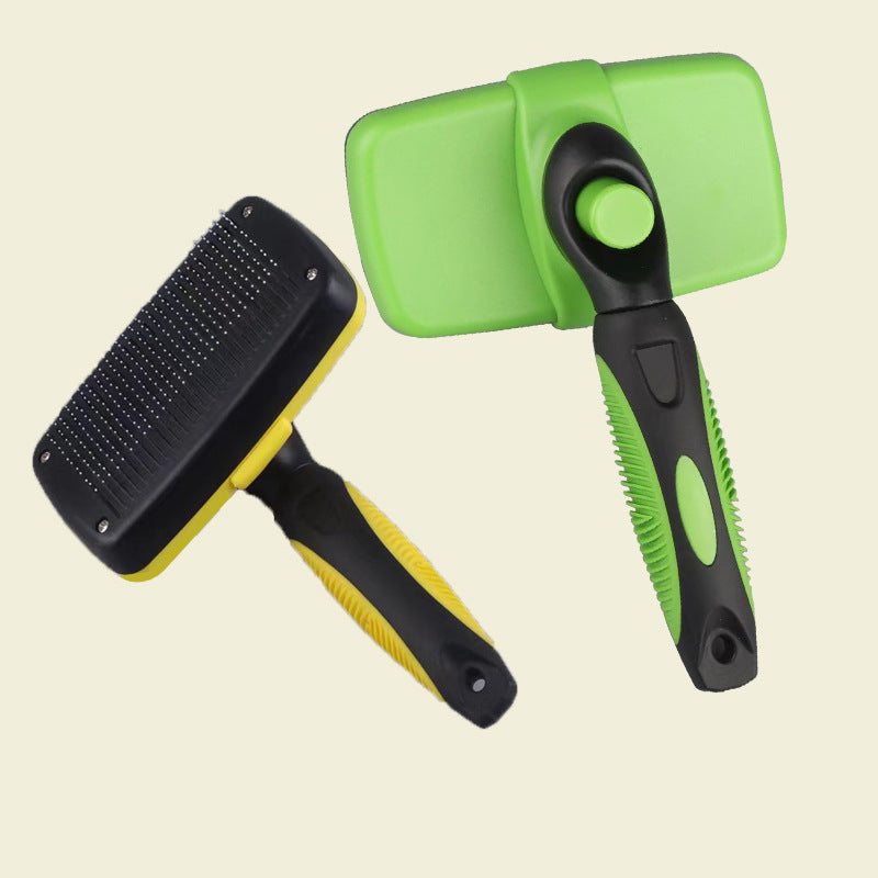 Green self-cleaning pet retractable brush with black comb and protective cover