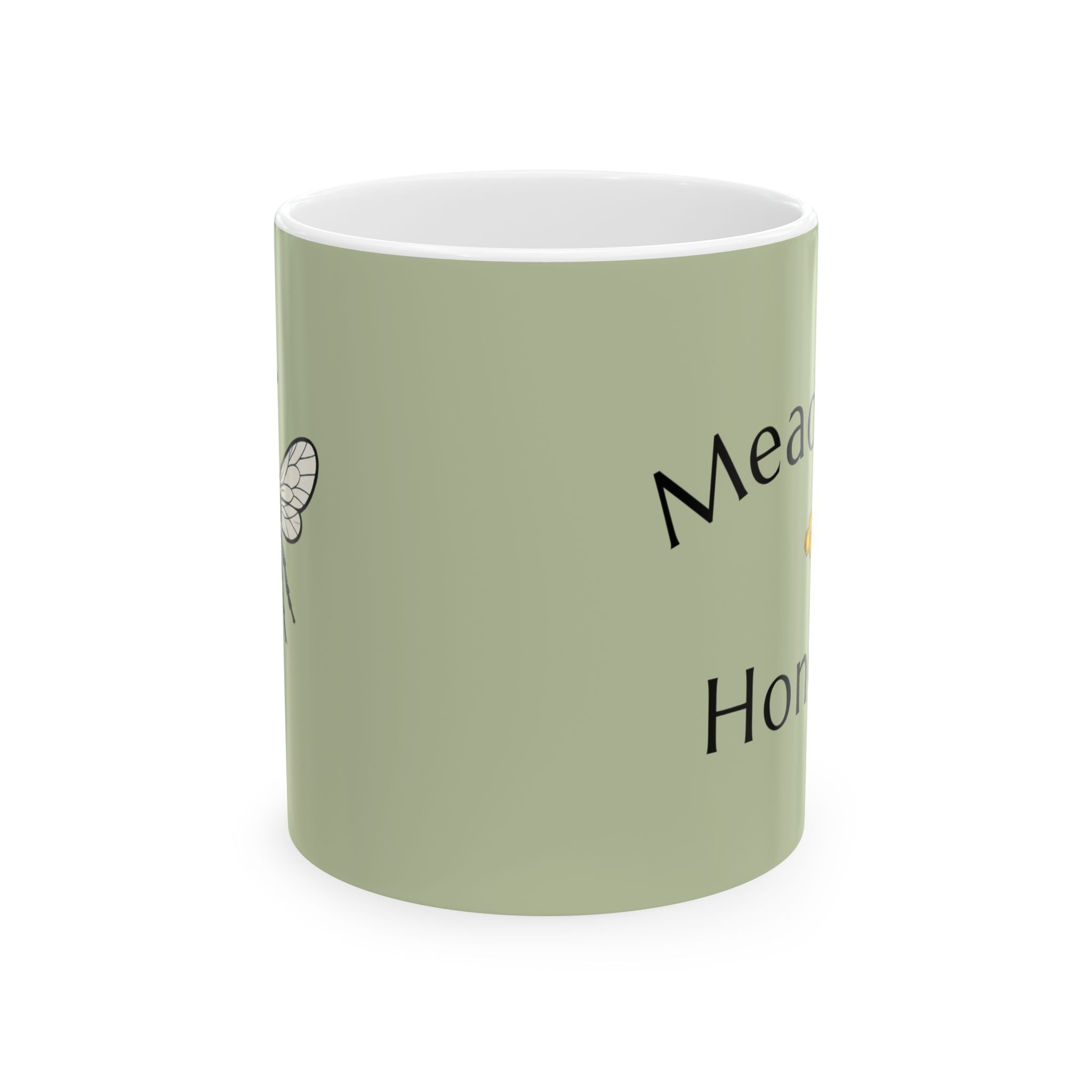 Olive green ceramic mug with partial “Meadow Honey” text and small bee icon