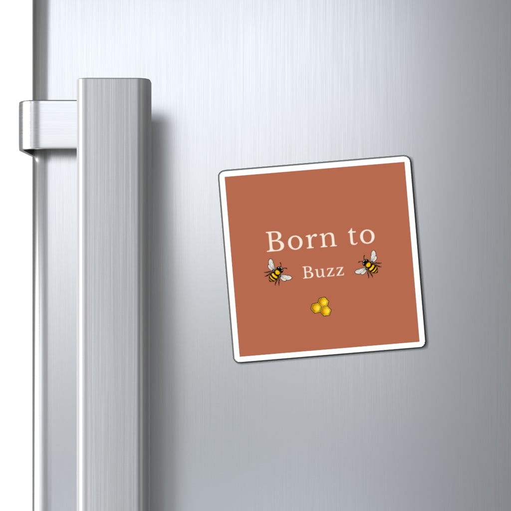 Square rust magnet on metal bar with 'Born to Buzz', bee icons and honeycomb