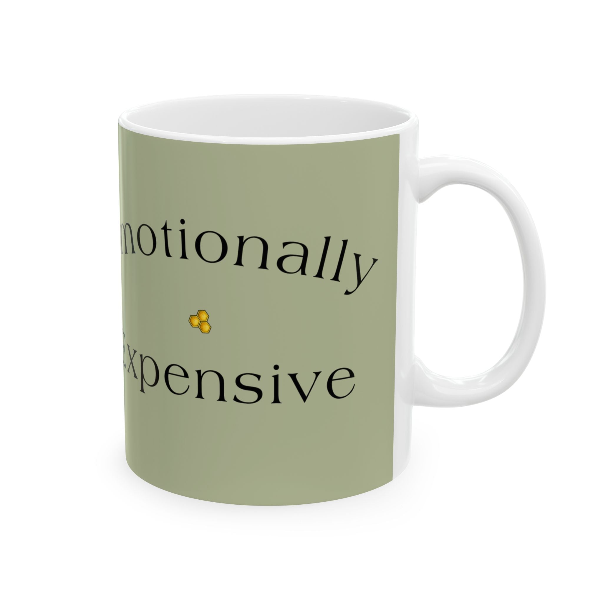 Green ceramic mug with partial black quote text and small yellow flower icon