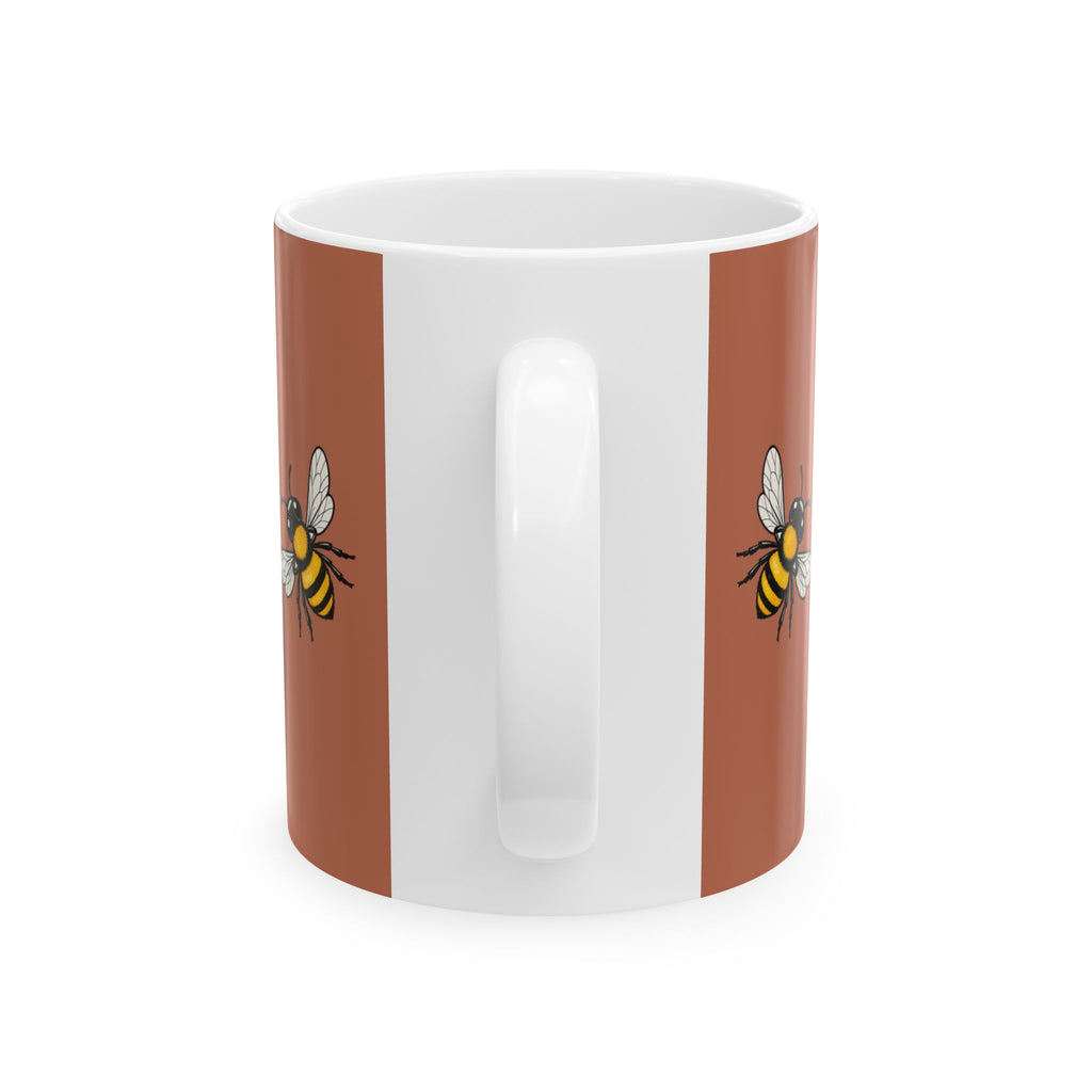 Brown-and-white mug with two side bee illustrations and a white handle
