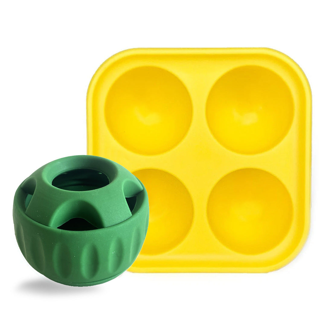 Green slow feeder ball with matching yellow silicone tray and four feeding wells