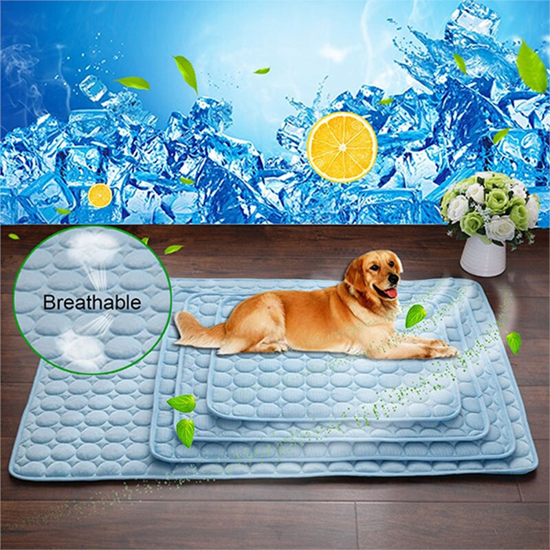 Blue pet cooling nest pad with quilted bubble texture, dog lying on it