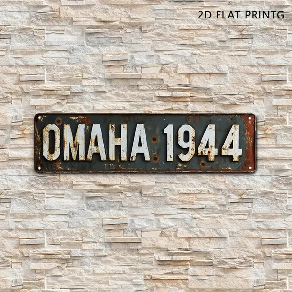 Vintage military metal sign with rivets, reading OMAHA 1944