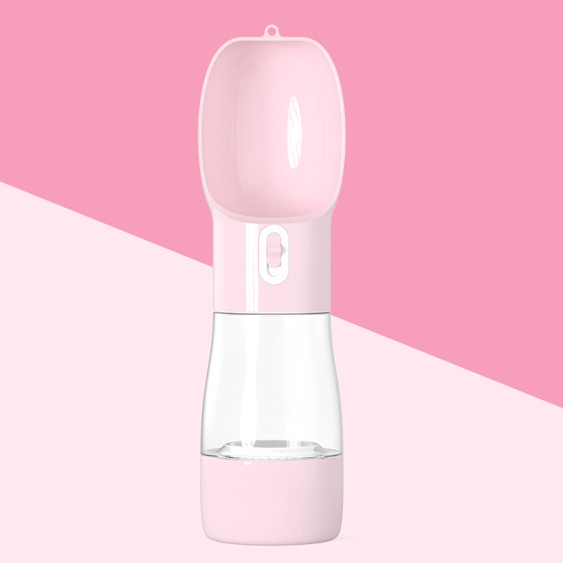 2-in-1 portable pet water and food dispenser in pink with clear lower cup