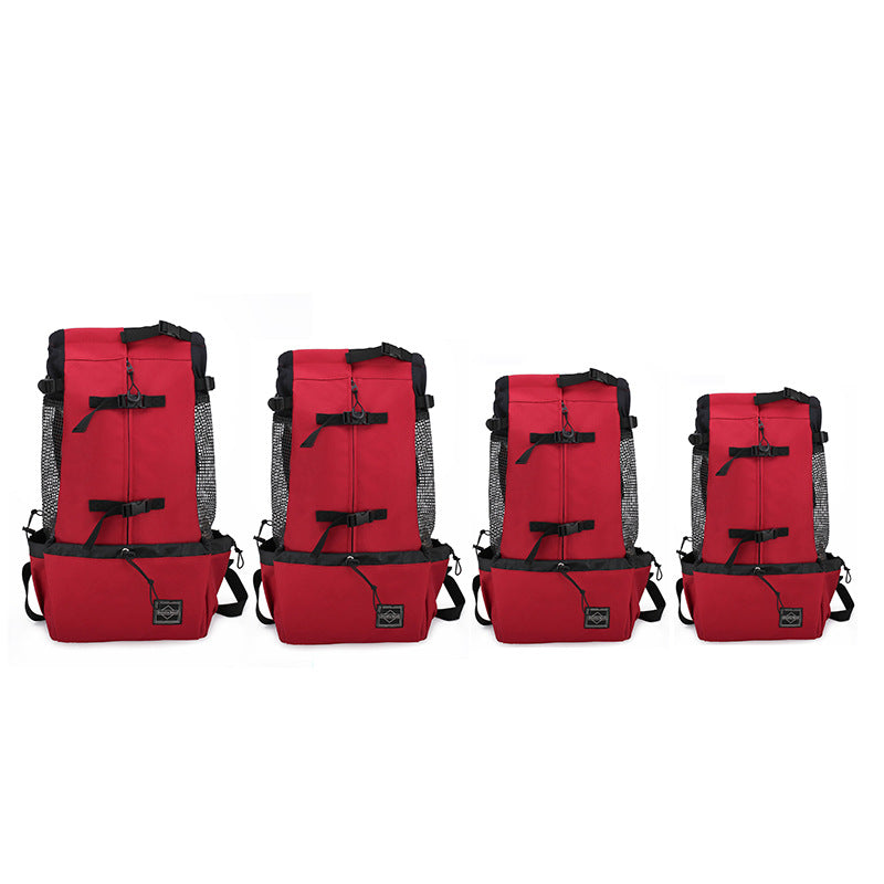 Red pet carrier backpack set with black mesh side panels and multiple adjustable straps