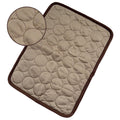 Beige cooling pet mat with dark brown border, round bubble-texture surface