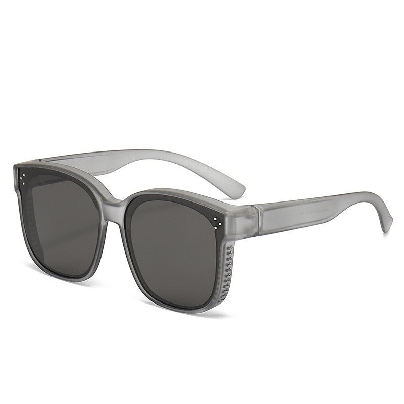 Square polarized sunglasses with dark lenses and clear-gray frame, textured temple tips