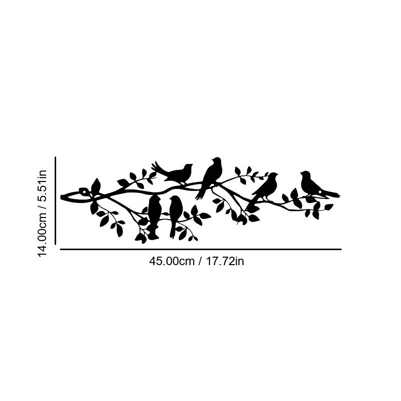 Abstract iron wall hanging with black birds, leaves, and small branch cutouts