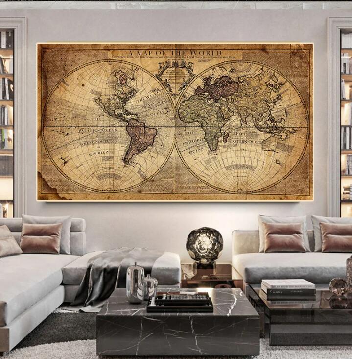 Framed world map canvas poster above modern sofa, vintage sepia coastlines