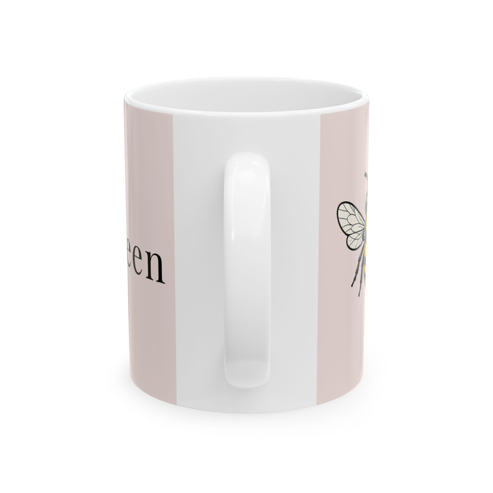 Pink and white ceramic mug with handle, featuring bee wing design