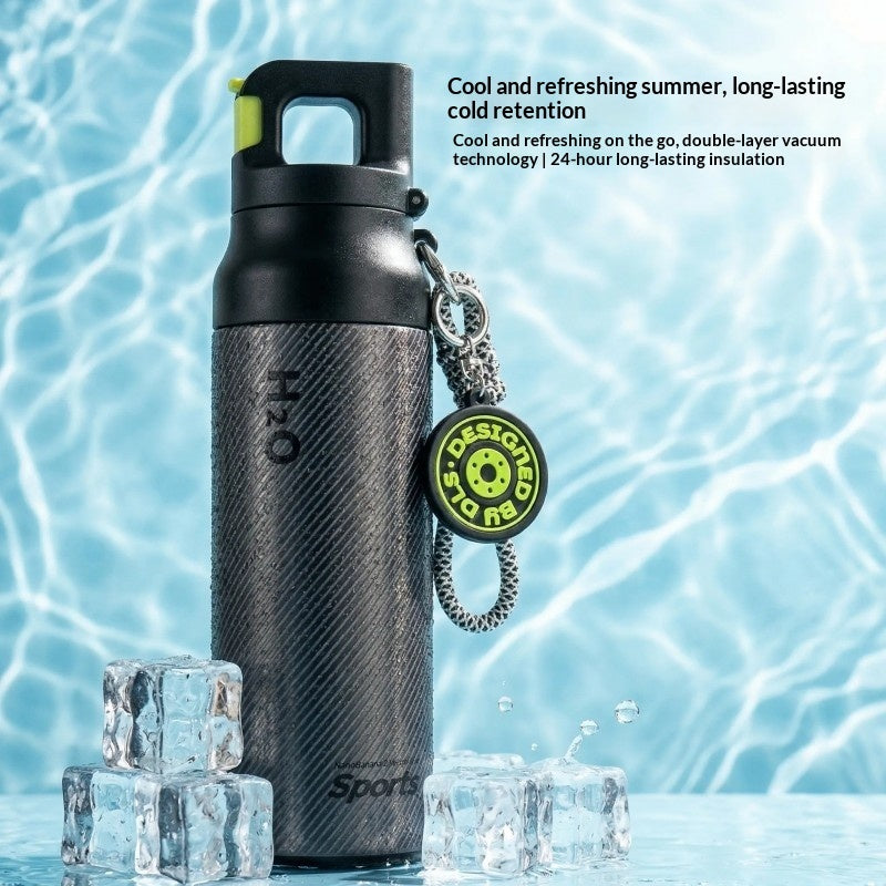 Black insulated water bottle with green-accent quick-open lid and chain