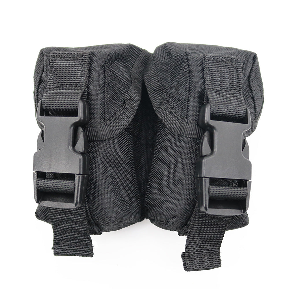 Multi-functional bag in dark gray/black woven fabric with side buckles and straps