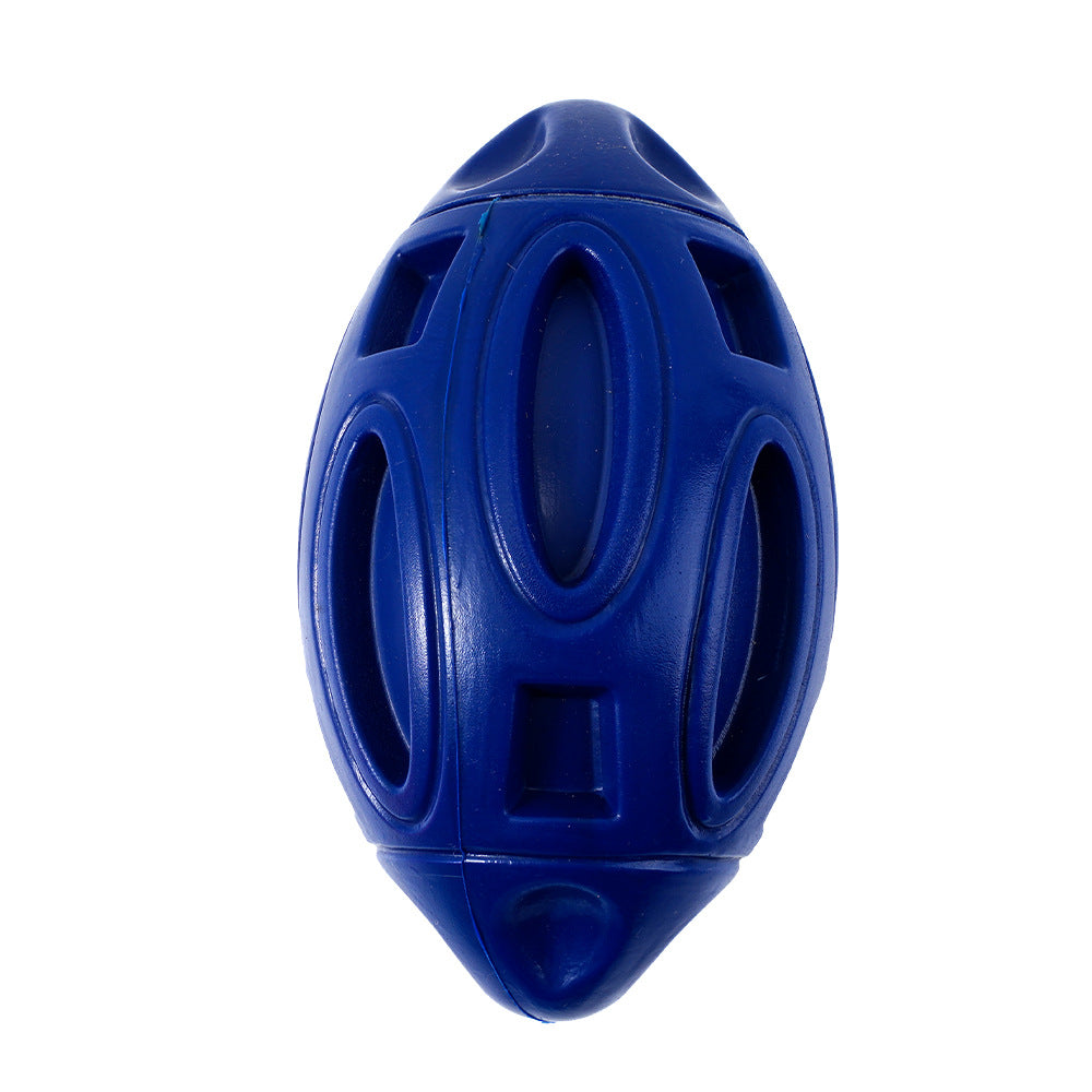 Dark blue squeaky rubber rugby dog toy ball with oval grip openings