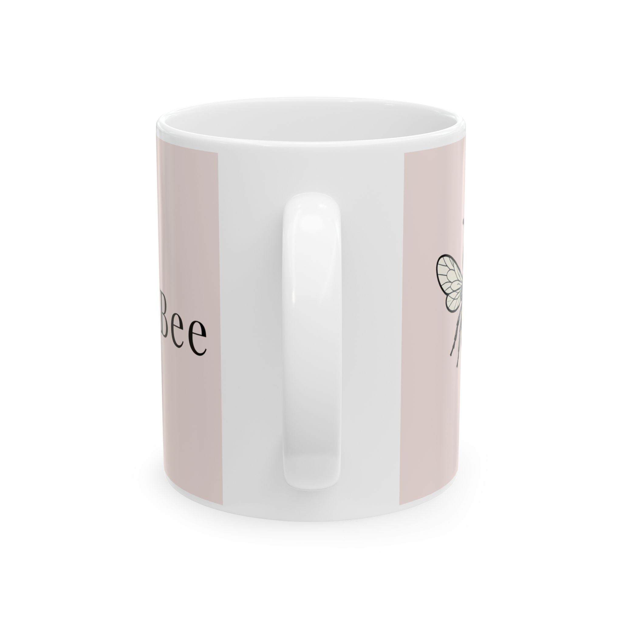 Pink ceramic coffee cup with side bee illustration and white interior