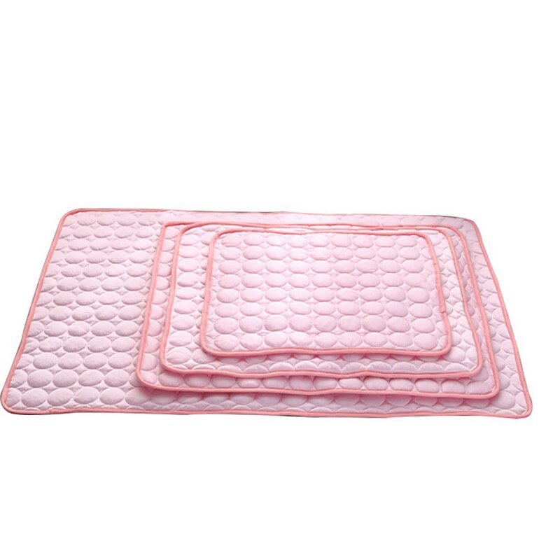 Pink pet cooling nest pad with quilted bubble texture, flat product view